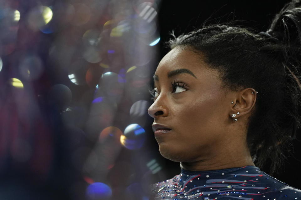 Simone Biles of the United States prepares to practice during a gymnastics training session at Bercy Arena at the 2024 Summer Olympics, Thursday, July 25, 2024, in Paris, France. (AP Photo/Abbie Parr)