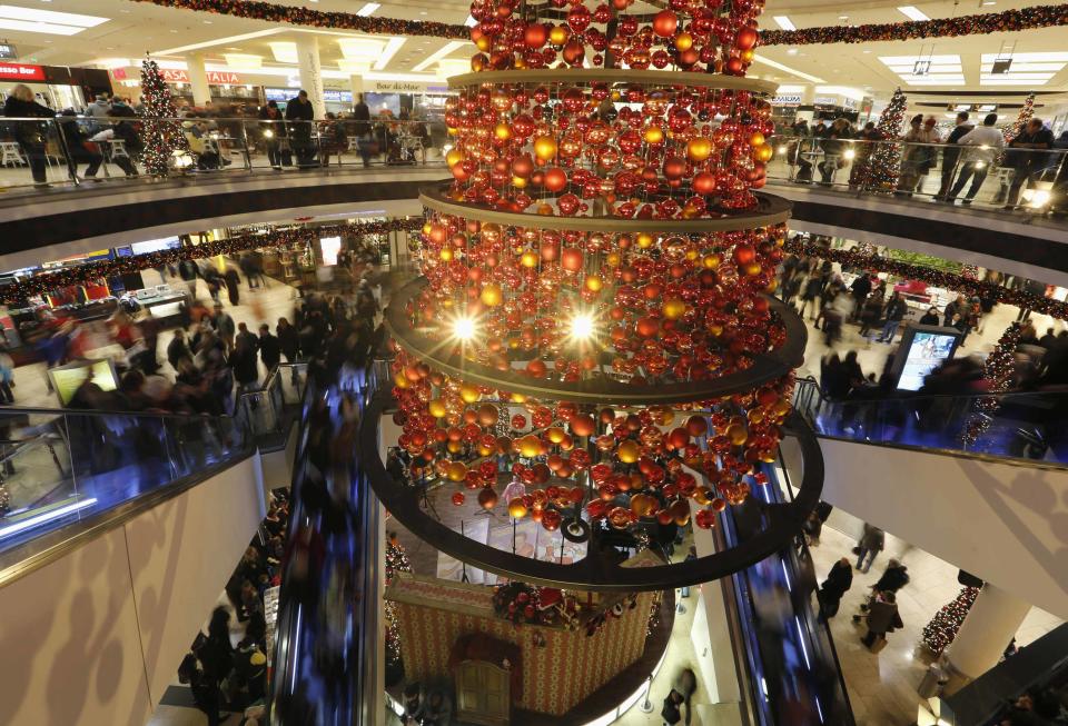 People walk through a shopping mall in Essen