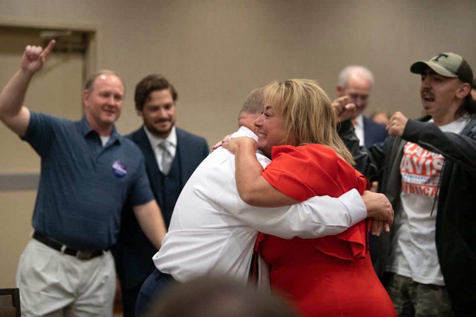 Gina Oster is congratulated by husband Stanton at the GOP election party as they announce Oster's win the seat for Knox County Commission District 3 in Knoxville, Tenn on Thursday, August 4, 2022. 