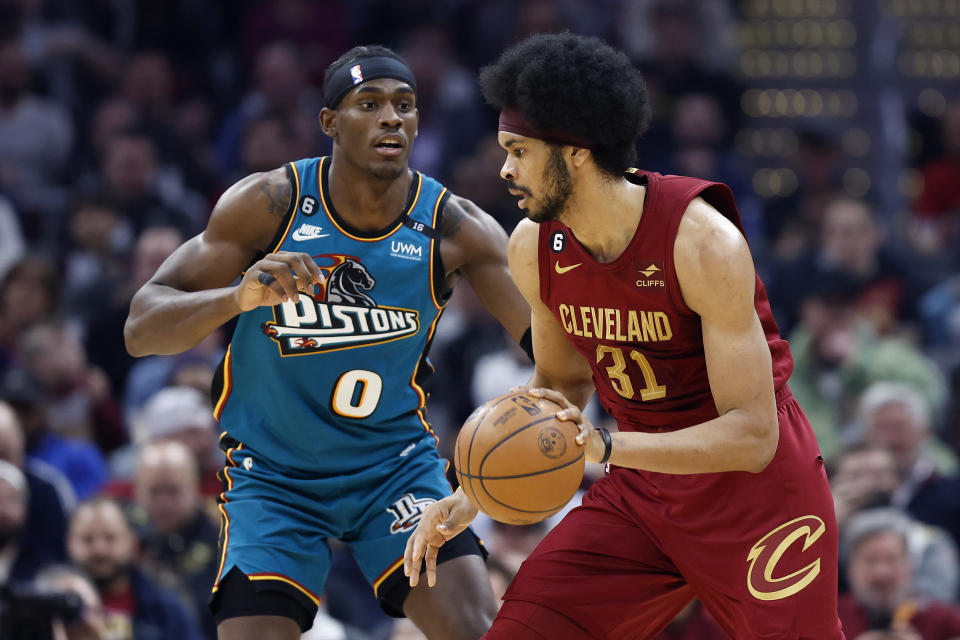 Cleveland Cavaliers center Jarrett Allen (31) plays against Detroit Pistons center Jalen Duren (0) during the first half of an NBA basketball game, Wednesday, Feb. 8, 2023, in Cleveland. (AP Photo/Ron Schwane)