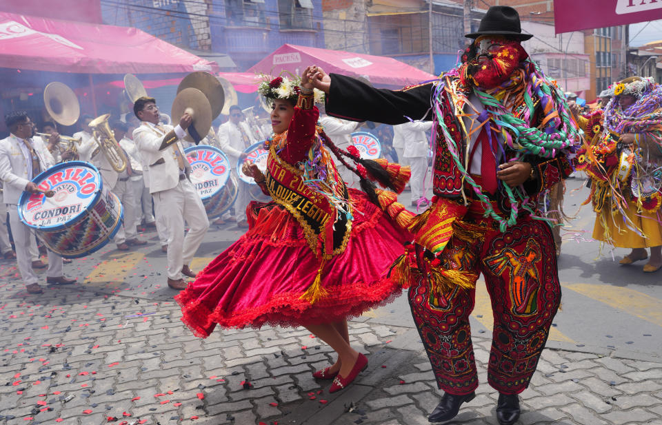 Revelers dance on the closing day of Carnival in La Paz, Bolivia, Sunday, Feb. 18, 2024. (AP Photo/Juan Karita)