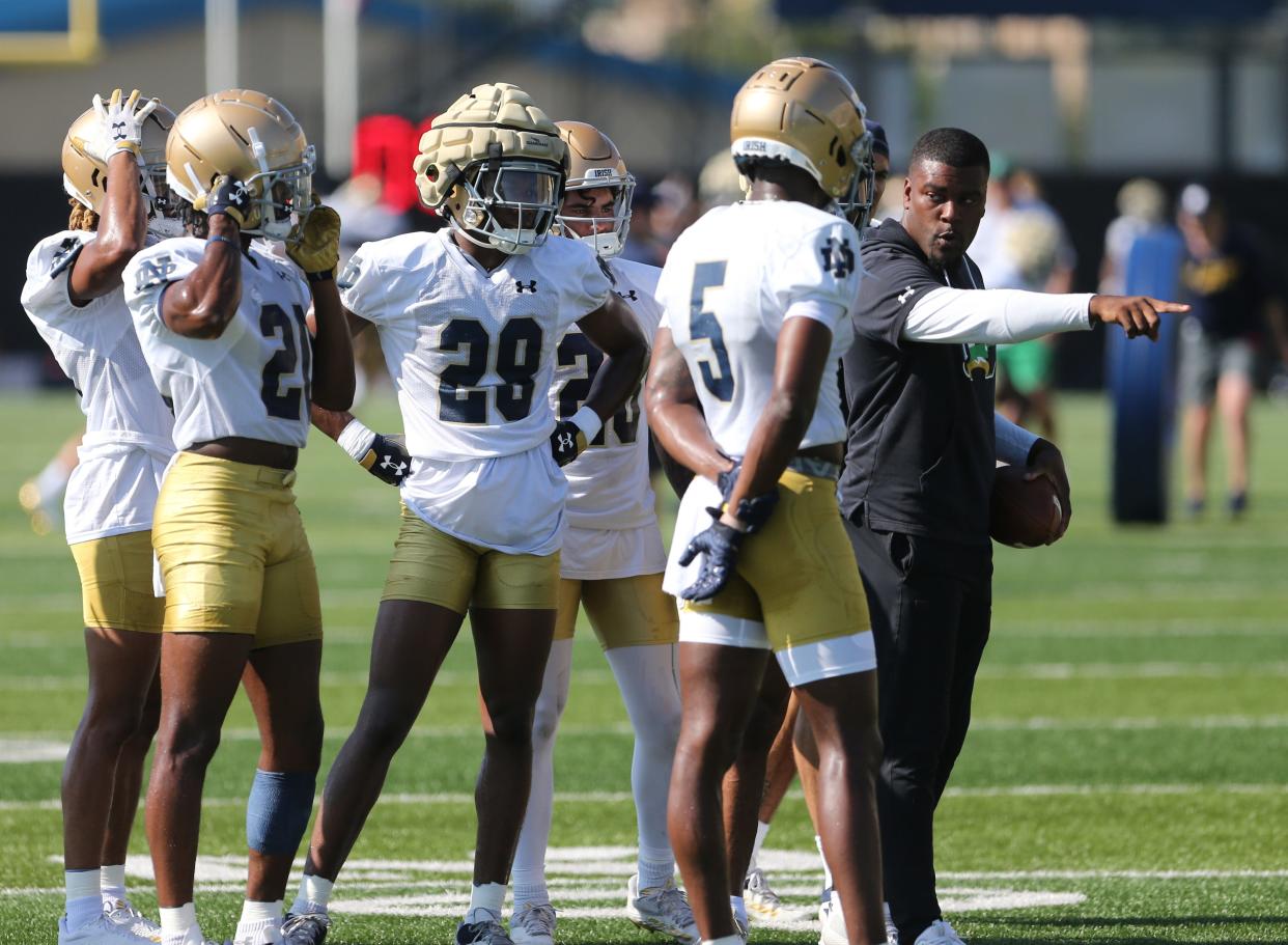 Notre Dame cornerbacks coach Mike Mickens works with players during Notre Dame football fall camp Thursday, July 27, 2023, at the Irish Athletics Center in South Bend.