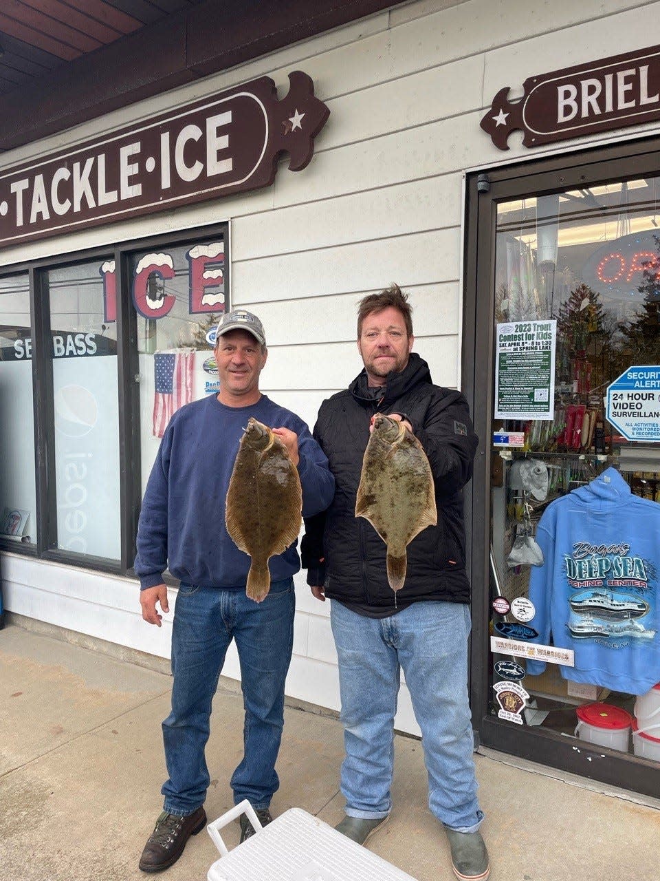 Kevin Pento of Brick  and Brian Hanlon of Eatontown with a catch of winter flounder from Barnegat Bay.
