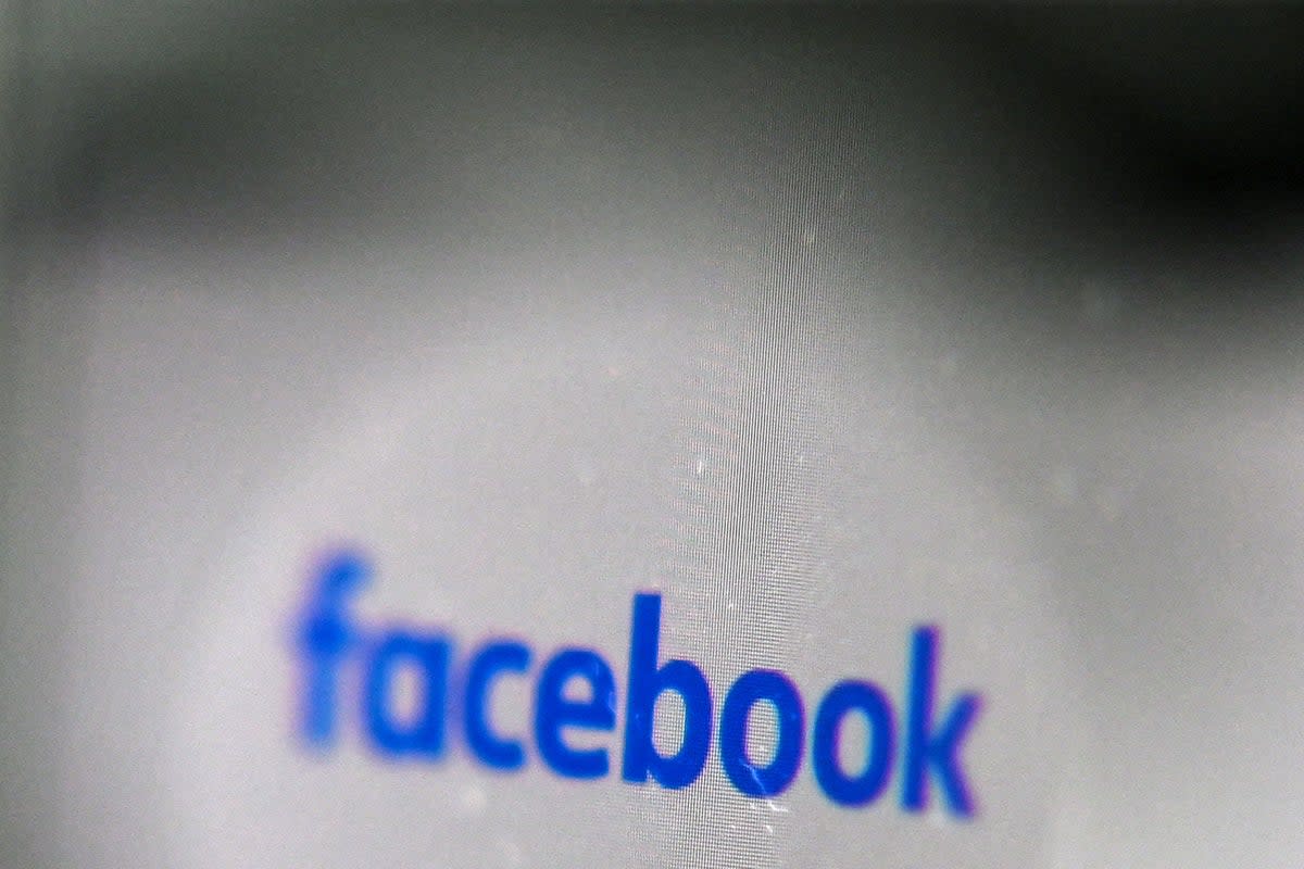 Facebook logo is pictured on a laptop screen in Moscow, Russia, on 26 August, 2021 (Getty Images)