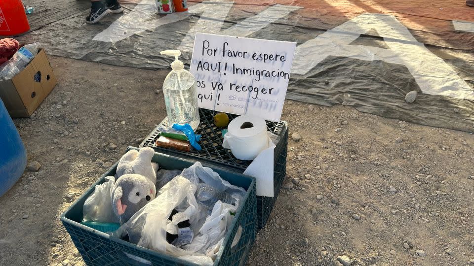 A sign left by humanitarians warning migrants and asylum seekers not to leave the isolated desert shelter. - Norma Galeana/CNN