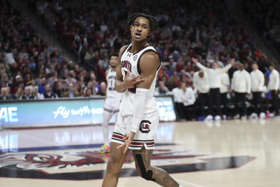 South Carolina guard Meechie Johnson (5) celebrates a made 3-pointer during the second half of an NCAA college basketball game against Florida Saturday, March 2, 2024, in Columbia, S.C. (AP Photo/Artie Walker Jr.)