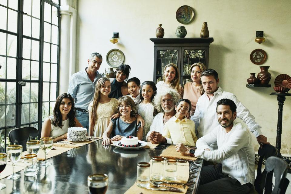 Moms, dads, grandparents, babysitters – a child’s whole network of caregivers contributes to their well-being. <a href="https://www.gettyimages.com/detail/photo/portrait-of-multigenerational-family-gathered-in-royalty-free-image/975317032" rel="nofollow noopener" target="_blank" data-ylk="slk:Thomas Barwick/Stone via Getty Images;elm:context_link;itc:0;sec:content-canvas" class="link ">Thomas Barwick/Stone via Getty Images</a>