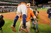 <p>Alex Bregman #2 and Jose Altuve #27 of the Houston Astros celebrate after defeating the Los Angeles Dodgers 5-1 in game seven to win the 2017 World Series at Dodger Stadium on November 1, 2017 in Los Angeles, California. (Photo by Harry How/Getty Images) </p>