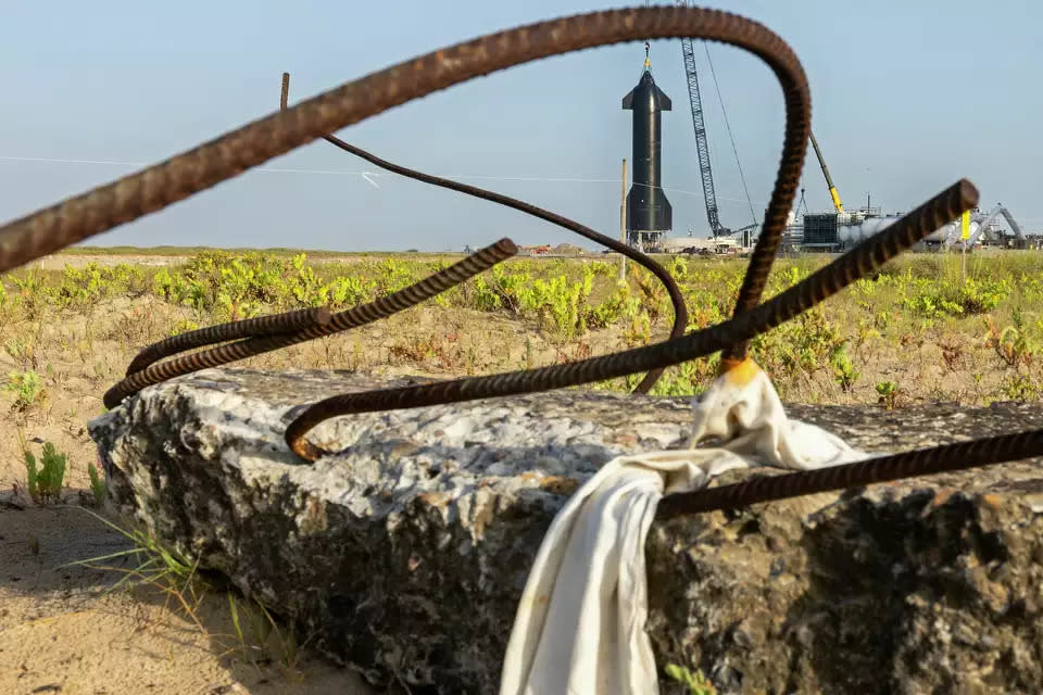 In late July, debris from an April mission was still scattered near the Starship launch tower at SpaceX's Starbase. The company is awaiting final approvals from the Federal Aviation Administration for its next flight.