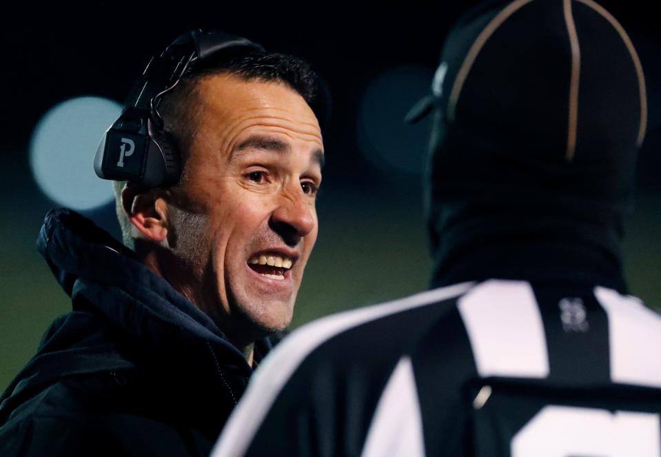 Bushland head coach Josh Reynolds talks to a referee in the format half. Bushland faces Jim Ned in a football playoff game, Friday, Nov. 18, 2022, at Lowrey Field PlainsCapital Park. 