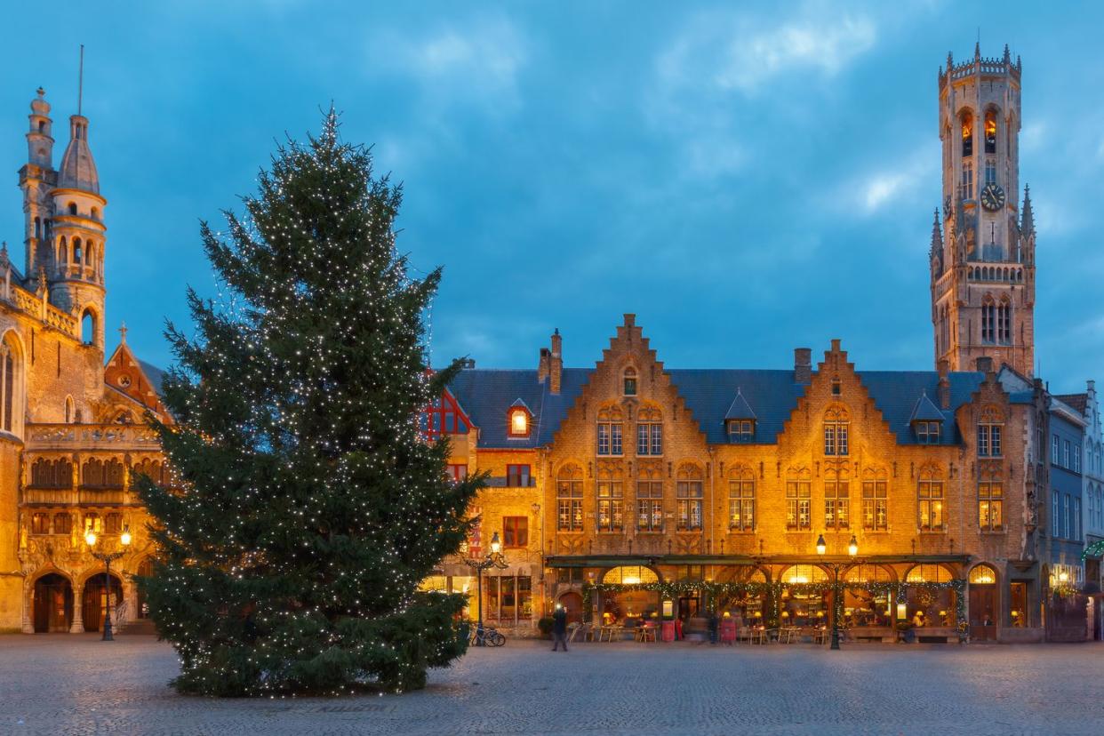 cityscape with the christmas burg square in bruges