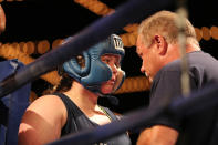 <p>Katie Walsh gets instructions from corner man before fight during the NYPD Boxing Championships at the Theater at Madison Square Garden on June 8, 2017. (Photo: Gordon Donovan/Yahoo News) </p>