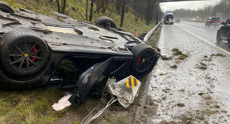 A flipped over Ferrari is seen on the M621 in England.