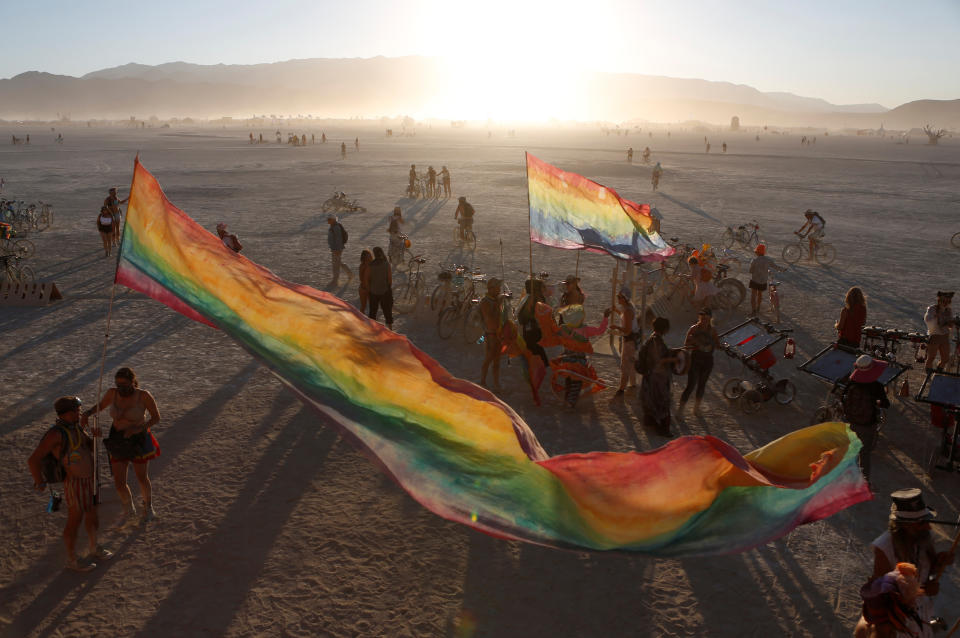 <p>The sun sets on the playa as approximately 70,000 people from all over the world gathered for the annual Burning Man arts and music festival in the Black Rock Desert of Nevada, Aug. 28, 2017. (Photo: Jim Urquhart/Reuters) </p>