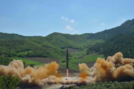The intercontinental ballistic missile Hwasong-14 is seen during its test launch. The launch came days before leaders from the Group of 20 nations were due to discuss steps to rein in North Korea's weapons programme, which it has pursued in defiance of U.N. Security Council sanctions. KCNA/via REUTERS