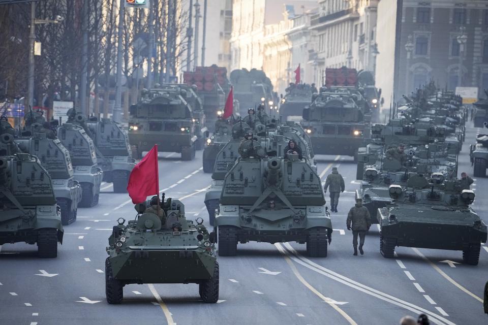 FILE - Russian self-propelled artillery vehicles, tanks and military vehicles roll along Tverskaya street toward Red Square to attend a rehearsal for the Victory Day military parade in Moscow, Russia, May 4, 2022. Some in the West think Russian President Vladimir Putin may use the Victory Day on May 9 when Russia celebrates the defeat of Nazi Germany in World War II to officially declare that war is underway in Ukraine and announce a mobilization _ the claim rejected by the Kremlin. (AP Photo/Alexander Zemlianichenko, File)