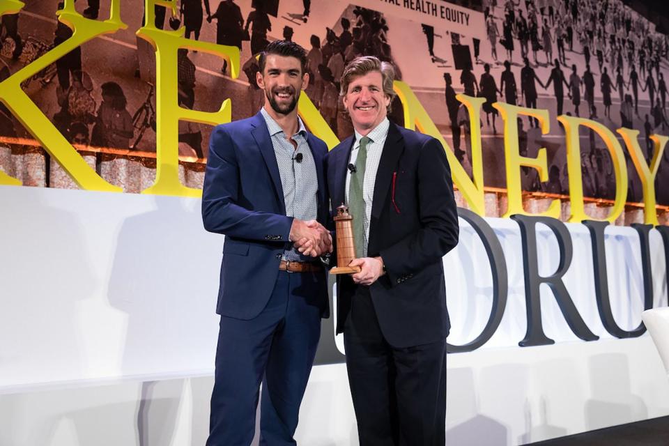 Patrick Kennedy with Olympic champion Michael Phelps at The Kennedy Forum's 2018 annual meeting.