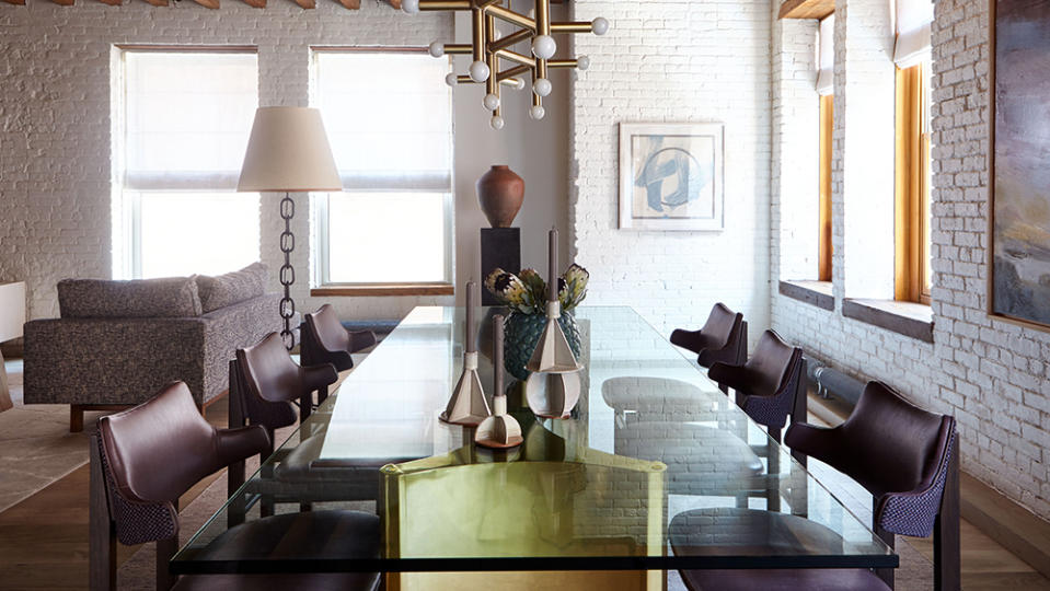 The dining room area, which features a chandelier from Remains Lighting - Credit: Joshua McHugh