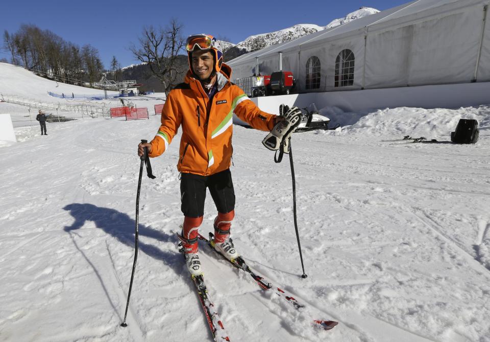 India's Himanshu Thakur poses for a photo near the finish area for the alpine skiing at the Sochi 2014 Winter Olympics, Thursday, Feb. 13, 2014, in Krasnaya Polyana, Russia. The reinstatement of India's Olympic Association for the Sochi Games meant more than just a flag change for Alpine skier Himanshu Thakur. It meant he was provided with skis, boots and poles for next week's giant slalom race. (AP Photo/Luca Bruno)