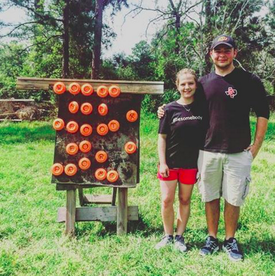 It’s hard to read, but the clay pigeons spell out ‘would you shoot for prom’ 