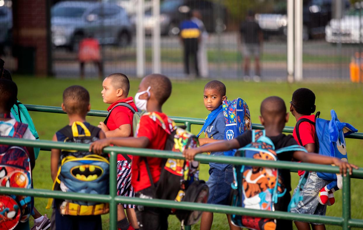 Students at Bond Elementary School assemble ahead of the start of the first day of school on Wednesday, Aug. 10, 2022 in Tallahassee, Fla. 