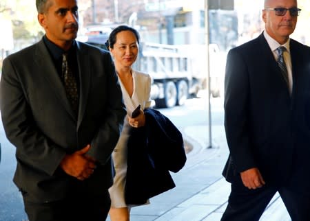 Huawei Technologies Chief Financial Officer Meng returns to British Columbia supreme court after a lunch break during a hearing in Vancouver