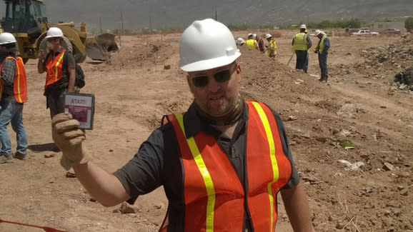 Film crew digs up decades-old E.T. game cartridges in New Mexico landfill