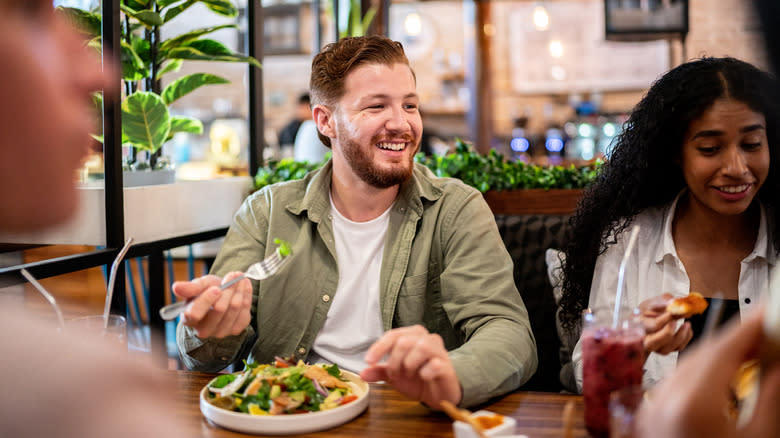 Group of people dining at restaurant 