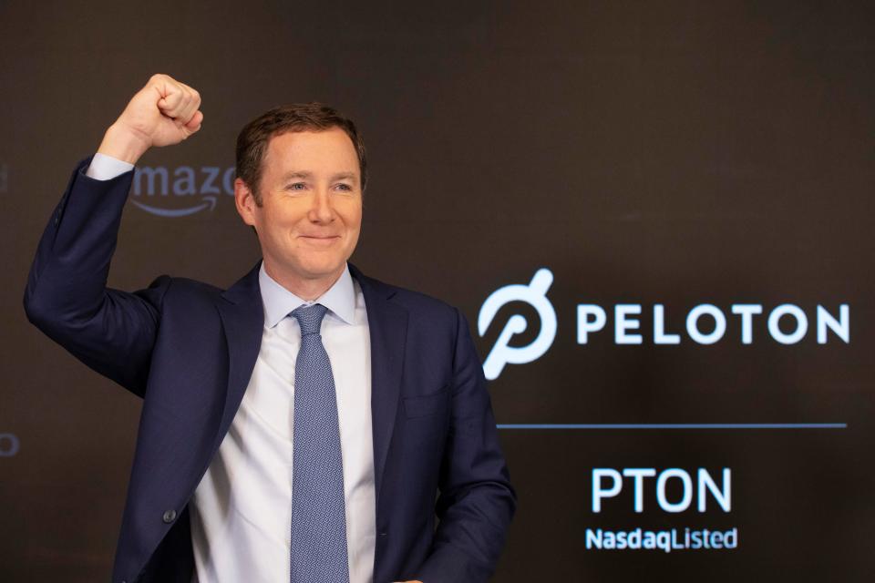 Peloton co-founder John Foley celebrates at the NASDAQ MarketSite on Sept. 26, 2019, the day of the company's IPO.