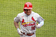 St. Louis Cardinals' Kolten Wong returns to the dugout after leading off the first baseball game of a doubleheader with a solo home run off Pittsburgh Pirates starting pitcher Trevor Williams in Pittsburgh, Friday, Sept. 18, 2020. (AP Photo/Gene J. Puskar)