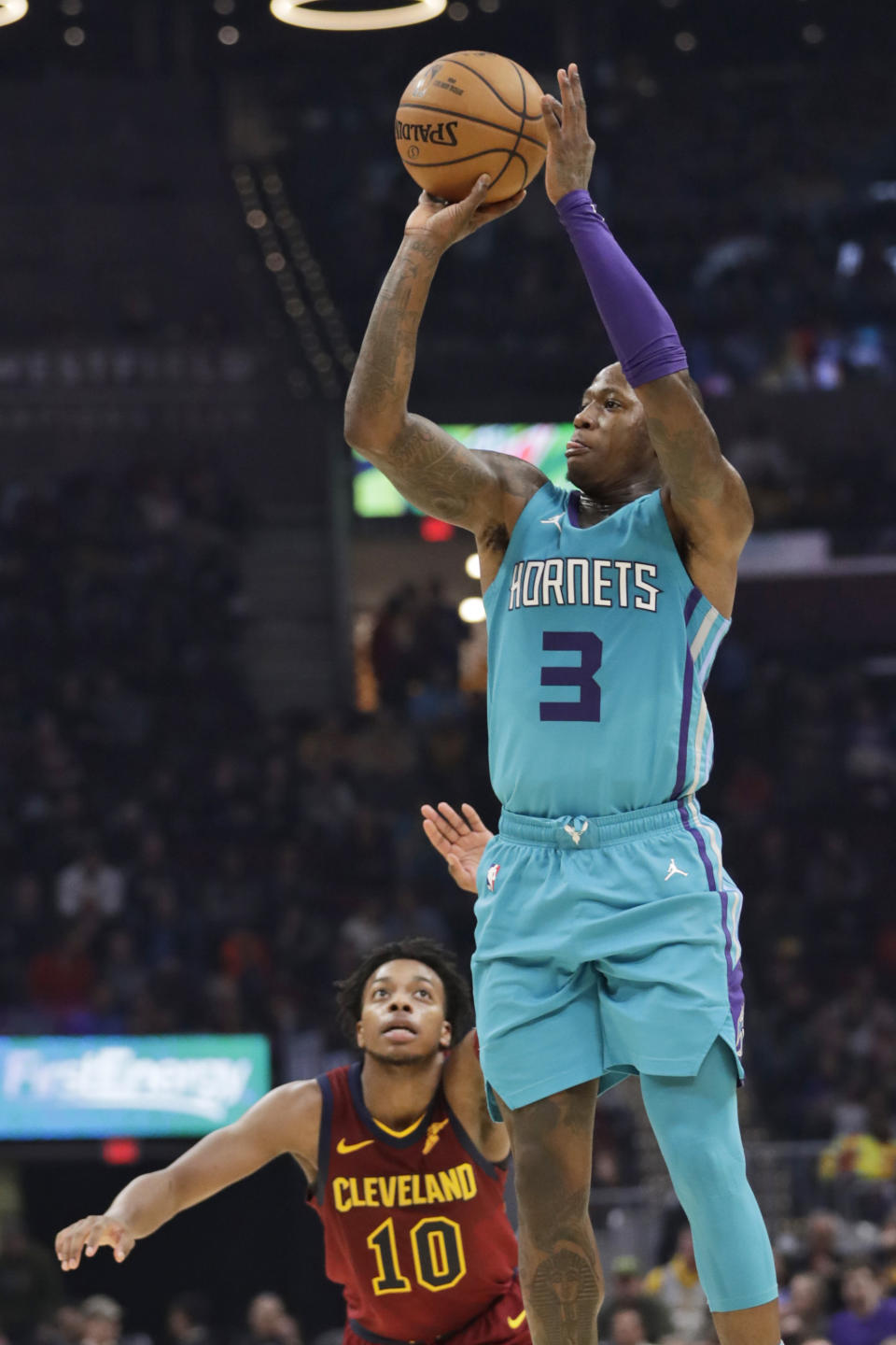 Charlotte Hornets' Terry Rozier (3) shoots against the Cleveland Cavaliers in the second half of an NBA basketball game, Thursday, Jan. 2, 2020, in Cleveland. (AP Photo/Tony Dejak)