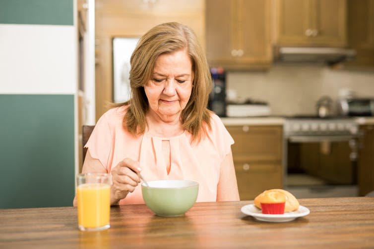 <span class="caption">Lack of appetite or lost interest in food are only some telltale signs.</span> <span class="attribution"><a class="link " href="https://www.shutterstock.com/image-photo/pretty-senior-woman-sitting-kitchen-without-628129295" rel="nofollow noopener" target="_blank" data-ylk="slk:antoniodiaz/ Shutterstock;elm:context_link;itc:0;sec:content-canvas">antoniodiaz/ Shutterstock</a></span>