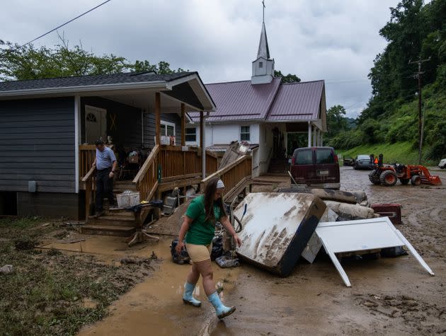 A local fire chief and his daughter drop off goods for a local community member in Jackson, Kentucky, on July 31. (Photo: SETH HERALD/AFP/Getty Images)