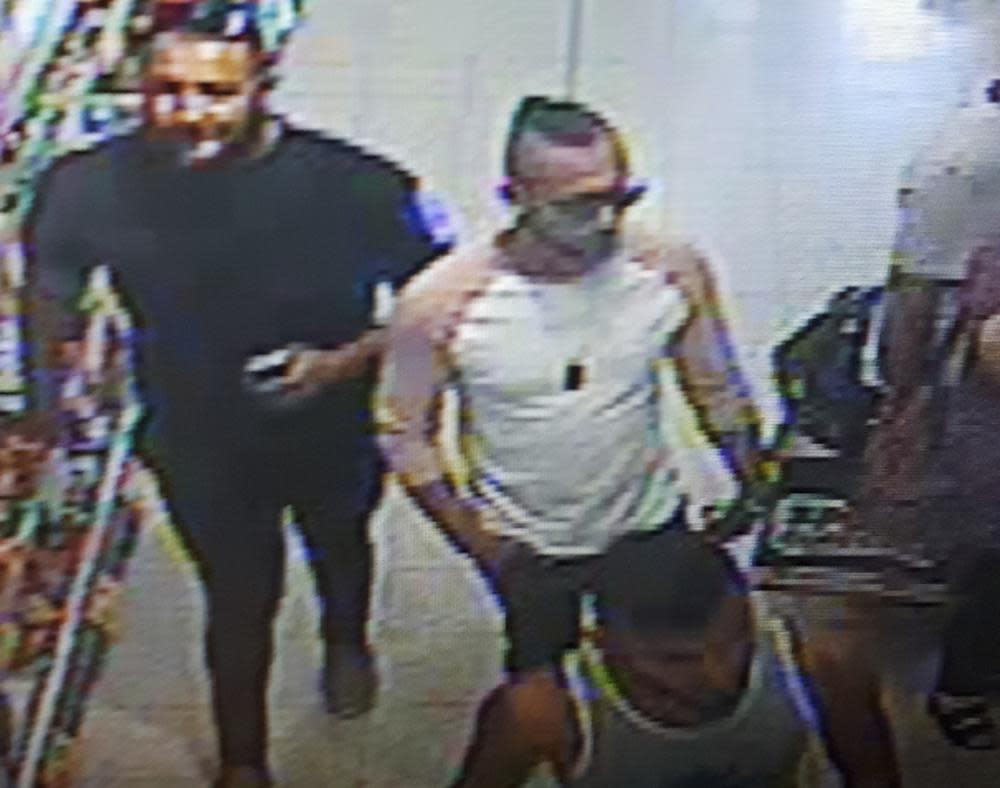 CCTV photo issued by West Mercia police of three men police are looking for in connection to the suspected acid attack on a three-year-old boy