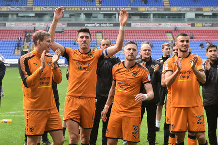 Soccer Football - Championship - Bolton Wanderers v Wolverhampton Wanderers - Macron Stadium, Bolton, Britain - April 21, 2018 Wolverhampton Wanderers players celebrate winning the Championship Action Images/Paul Burrows