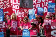 Pro "assisted dying" campaigners protest outside the Houses of Parliament in central London, Britain September 11, 2015. REUTERS/Stefan Wermuth