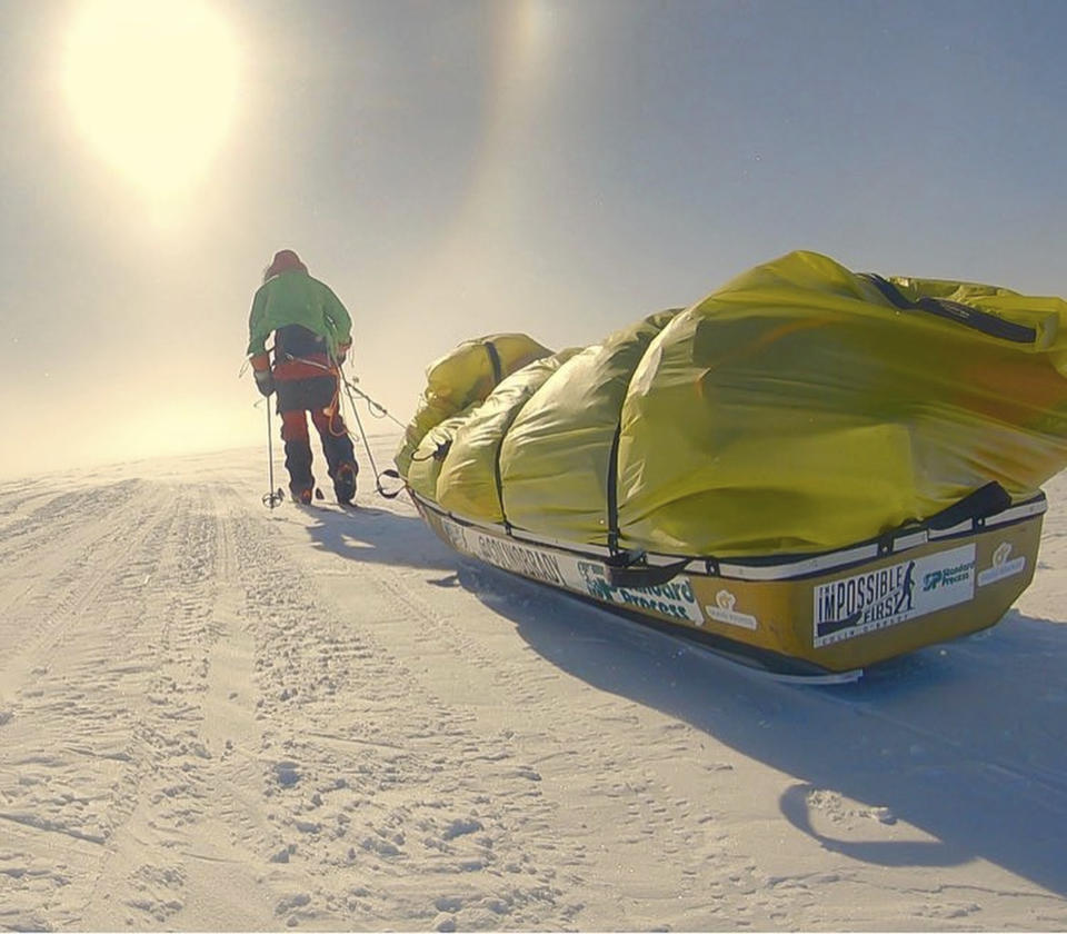 In this photo provided by Colin O'Brady, of Portland., Ore., he poses for a photo while traveling across Antarctica on Wednesday, Dec. 26, 2018. He has become the first person to traverse Antarctica alone without any assistance. O'Brady finished the 932-mile (1,500-kilometer) journey across the continent in 54 days, lugging his supplies on a sled as he skied in bone-chilling temperatures. (Colin O'Brady via AP)