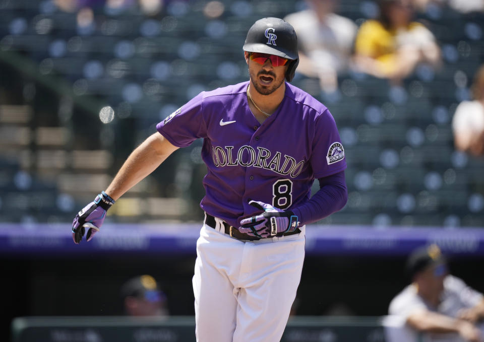 Colorado Rockies' Joshua Fuentes reacts after flying out against Pittsburgh Pirates starting pitcher Chad Kuhl in the second inning of a baseball game Wednesday, June 30, 2021, in Denver. (AP Photo/David Zalubowski)