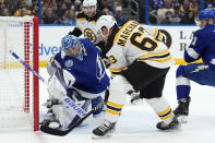 Tampa Bay Lightning goaltender Andrei Vasilevskiy (88) stops a shot by Boston Bruins left wing Brad Marchand (63) during the first period of an NHL hockey game Monday, Nov. 21, 2022, in Tampa, Fla. (AP Photo/Chris O'Meara)