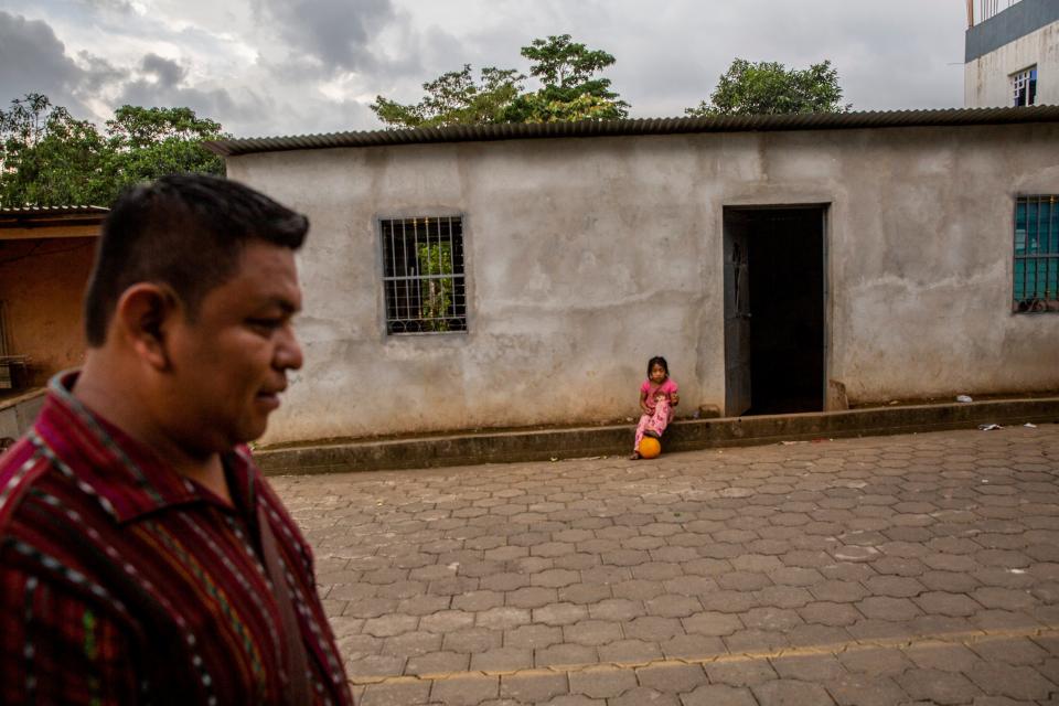 Antonio Chox, a community journalist and school teacher, helped his community identify five young men who had died in a fire at a migrant detention center in Juárez in March 27, 2023. Chox walks in a neighborhood in the Mayan village in Guatemala where the men called home.