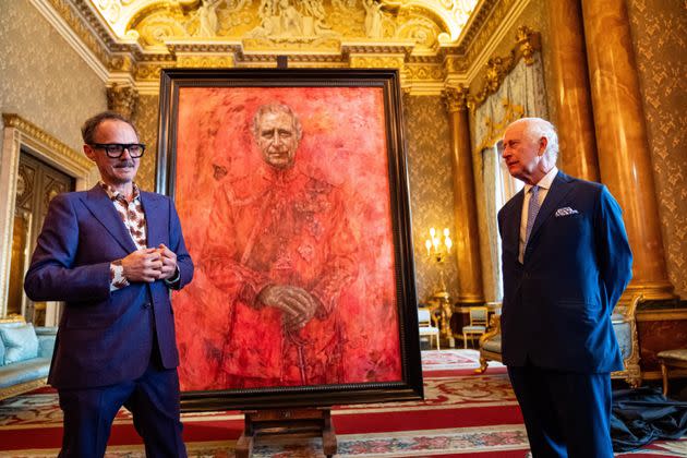 Artist Jonathan Yeo and King Charles III stand in front of the portrait of the monarch during its unveiling in London Tuesday.