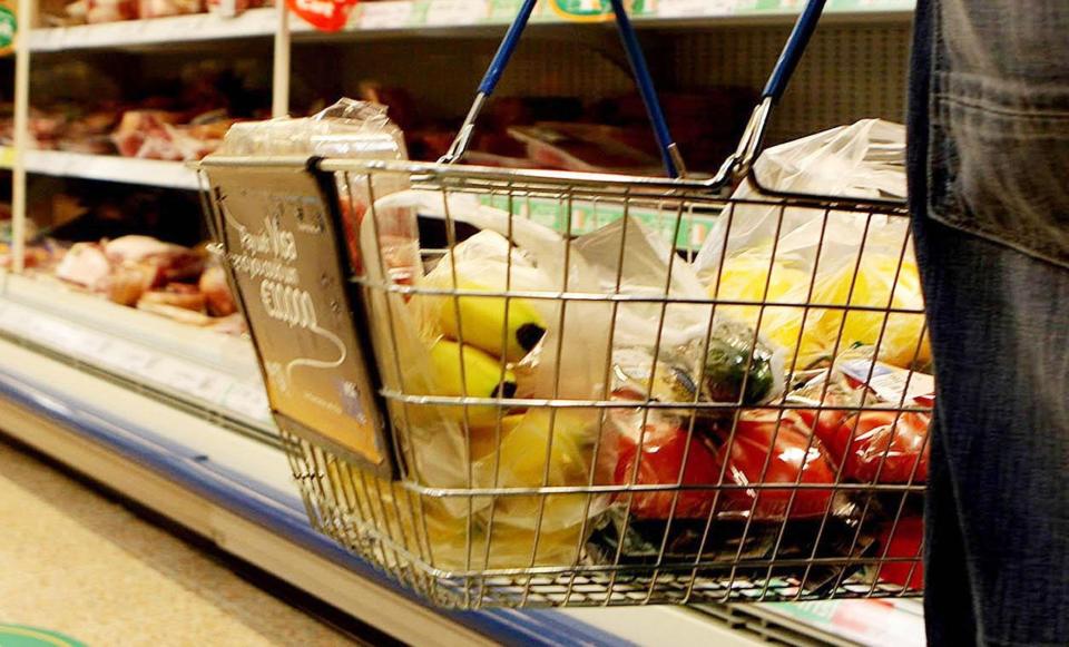 Food in a supermarket basket (PA Archive)