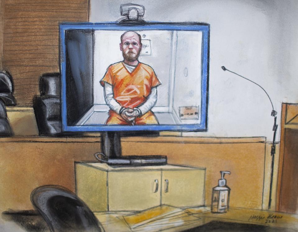 Jacob Chansley, who also goes by Jake Angeli, is seen in court sketches by courthouse sketch Maggie Keane at the Sandra Day O'Connor U.S courthouse in Phoenix on Jan. 15, 2020. Angeli was arrested and is facing felony charges related to the Jan. 6 raid on the U.S. Capitol.