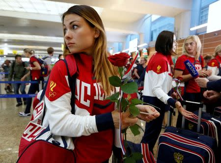 Russia's women's handball Olympic team member Sudakova waits for check-in before national team's departure to 2016 Rio Olympics at Sheremetyevo Airport outside Moscow, Russia, July 28, 2016. REUTERS/Sergei Karpukhin