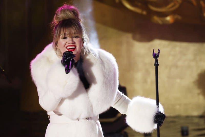 Kelly Clarkson performed "DJ Play a Christmas Song," a new No. 1 single from Cher, during Kellyoke. File Photo by John Angelillo/UPI