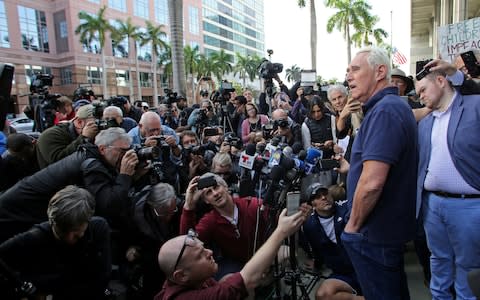 Roger Stone speaks after his appearance at Federal Court in Fort Lauderdale - Credit: Reuters
