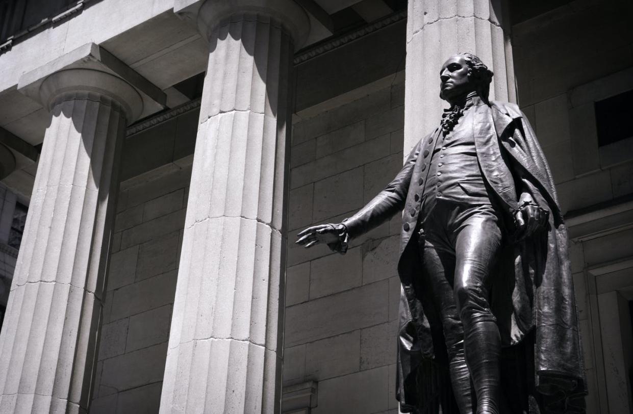 <span class="caption">Statue of George Washington in front of Federal Hall in New York City.</span> <span class="attribution"><a class="link " href="https://www.gettyimages.com/detail/photo/george-wahington-statue-royalty-free-image/172154583?adppopup=true" rel="nofollow noopener" target="_blank" data-ylk="slk:Getty Images;elm:context_link;itc:0;sec:content-canvas">Getty Images</a></span>