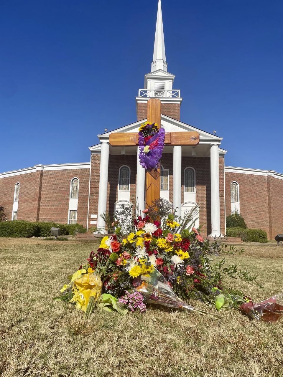 Flowers sit in a memorial to Bubba Copeland outside First Baptist Church in Phenix City, Ala., on Nov. 5, 2023. Copeland, the pastor of the church and the mayor of Smiths Station died by suicide. (AP Photo/Kim Chandler)