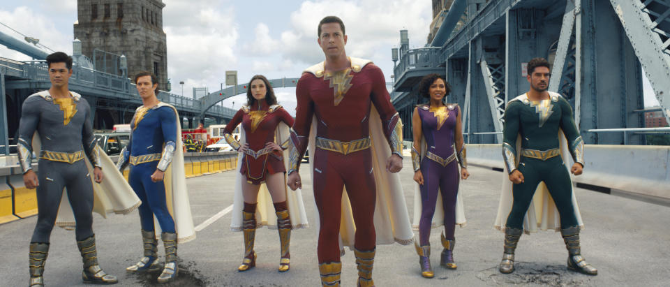 This image released by Warner Bros. Pictures shows Ross Butler, from left, Adam Brody, Grace Caroline Currey, Zachary Levi, Meagan Good and D.J. Cotrona in a scene from "Shazam! Fury of the Gods." (Warner Bros. Pictures via AP)