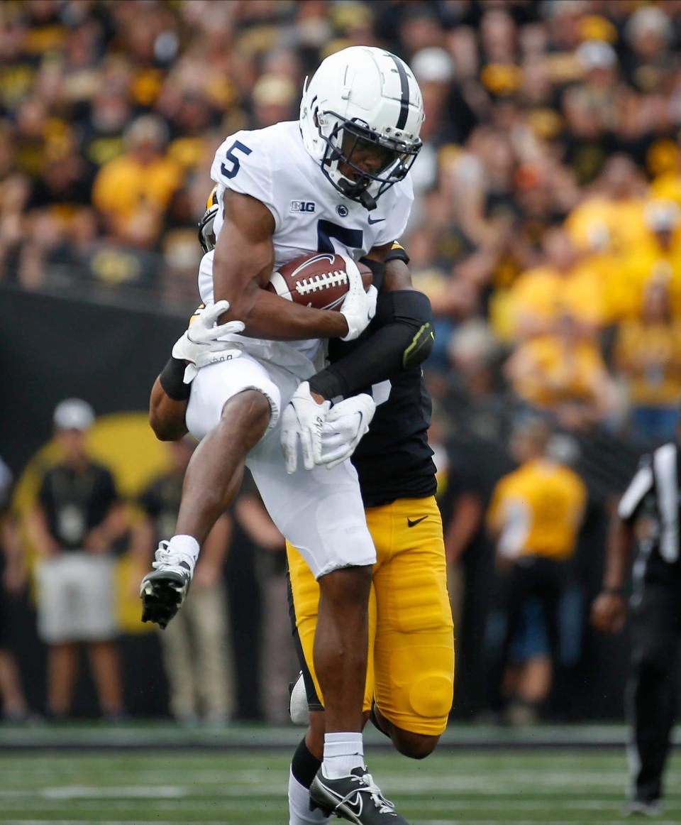 Penn State wide receiver Jahan Dotson pulls in a catch in the first quarter against Iowa at Kinnick Stadium in Iowa City, Iowa, on Saturday, Oct. 9, 2021. 